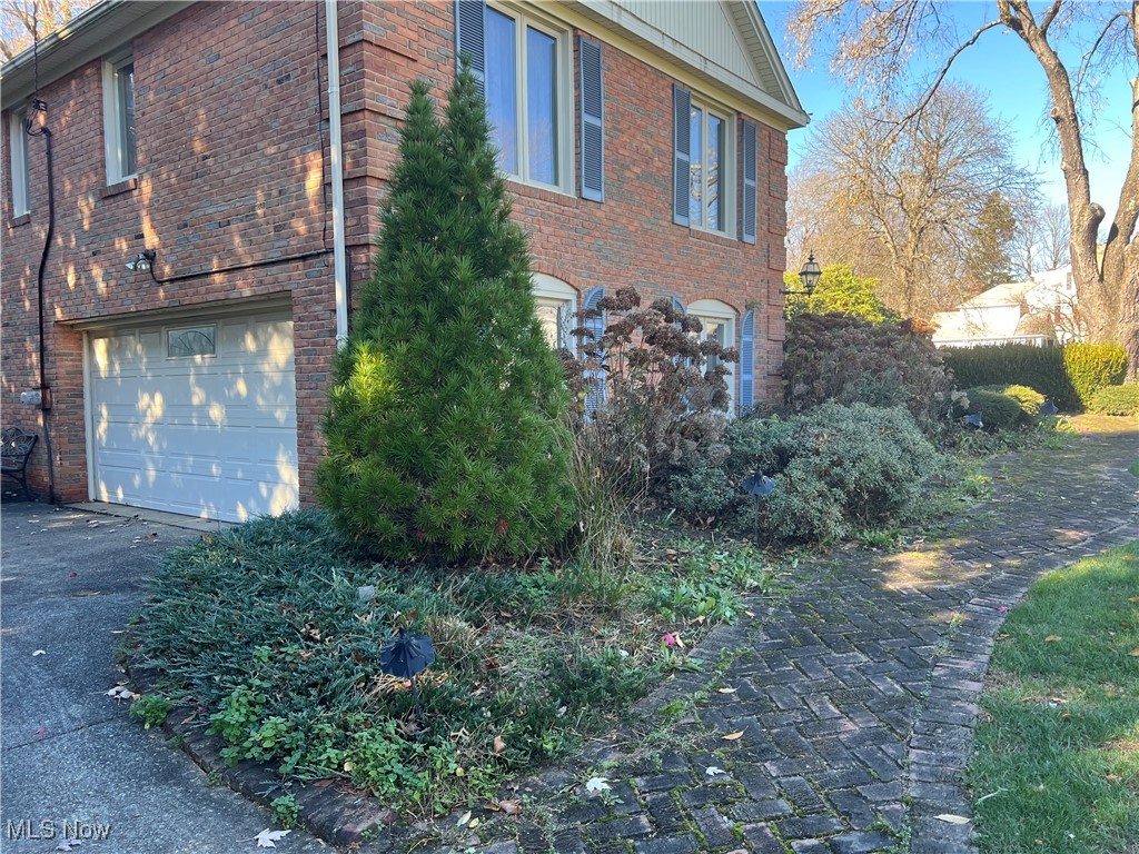 3330 Stanley Road Akron, OH 44333 - Photo 22 of 22 View of side of property with a garage