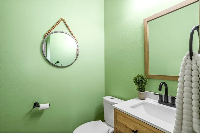 a spacious bedroom with a bed and window