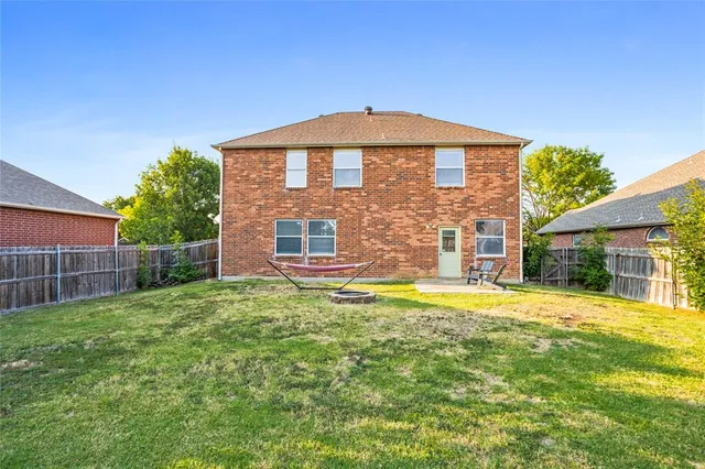 swimming pool view with outdoor seating
