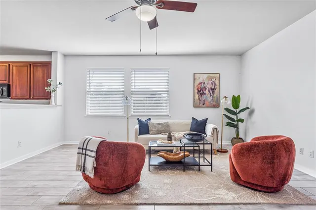 a kitchen with stainless steel appliances granite countertop a refrigerator stove and sink