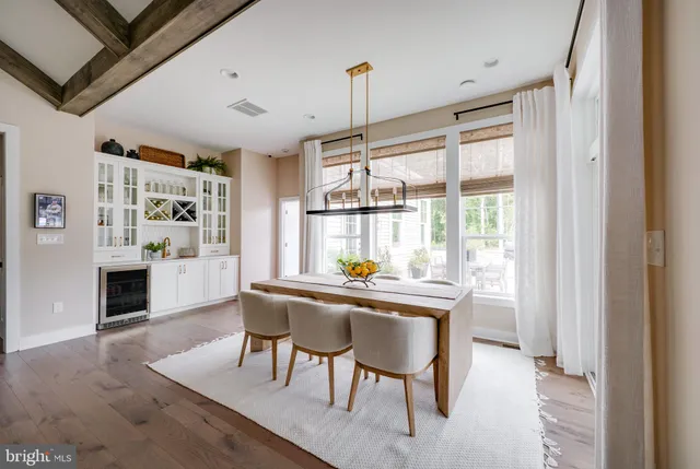 a kitchen with stainless steel appliances granite countertop a stove and a refrigerator