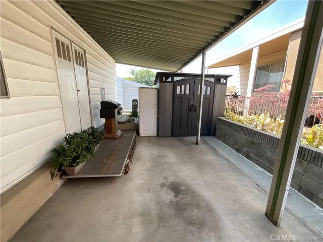 a view of a porch with furniture