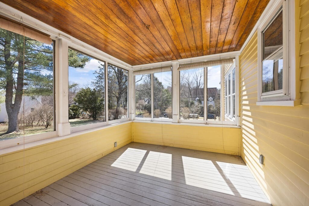 8 Spring Street Lexington, MA 02421 - Photo 20 of 35 a view of a room with wooden floor and outdoor space