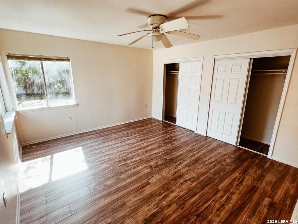 5562 Rangeland San Antonio, TX 78247 - Photo 3 of 9 a bedroom with a bed and a window