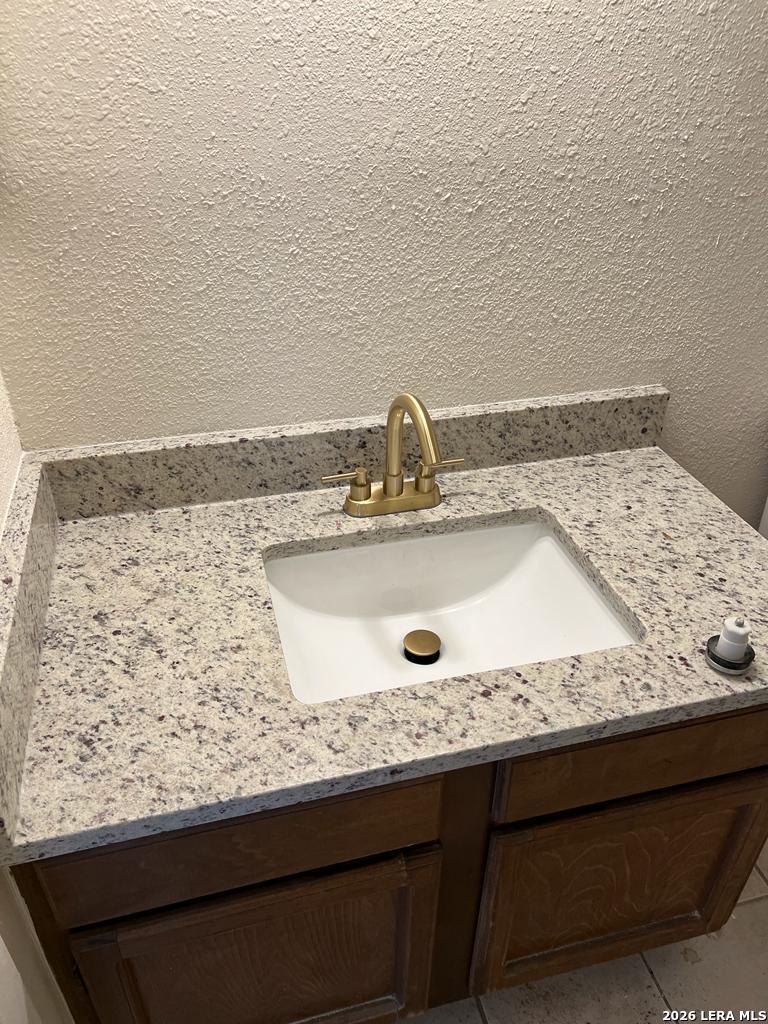 5562 Rangeland San Antonio, TX 78247 - Photo 7 of 9 a close view of sink and tap
