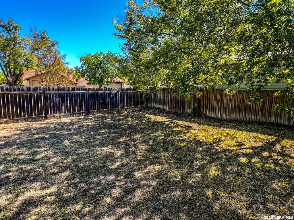 5562 Rangeland San Antonio, TX 78247 - Photo 9 of 9 a view of a backyard of a house