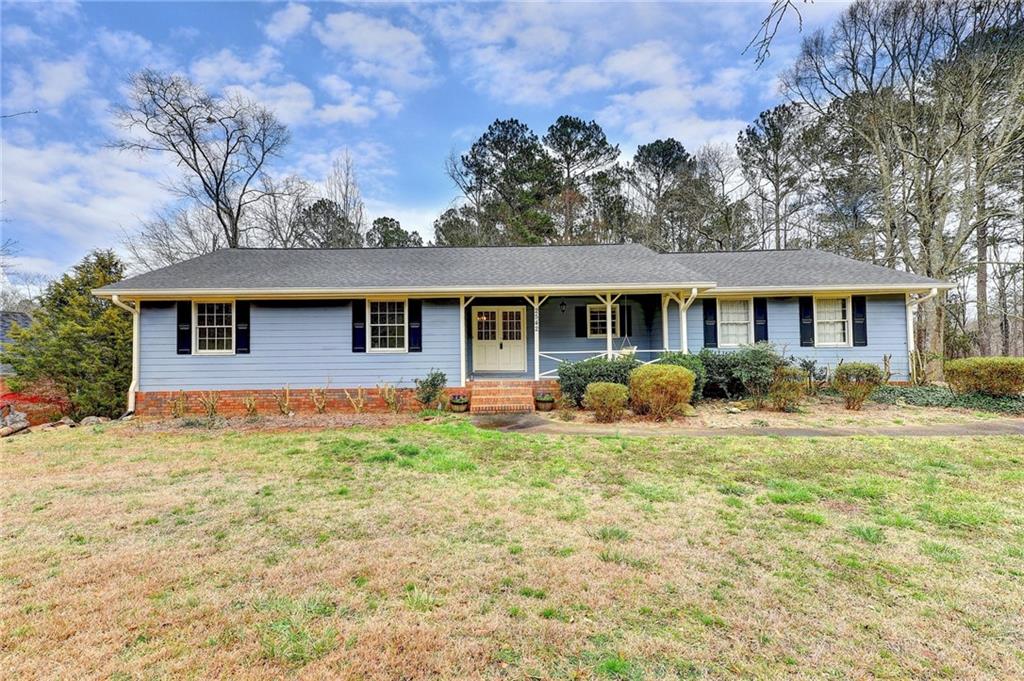 2542 Centerville Rosebud Road Loganville, GA 30052 - Photo 1 of 1 Adorable ranch with a partially finished huge basement on almost 3 acres!!