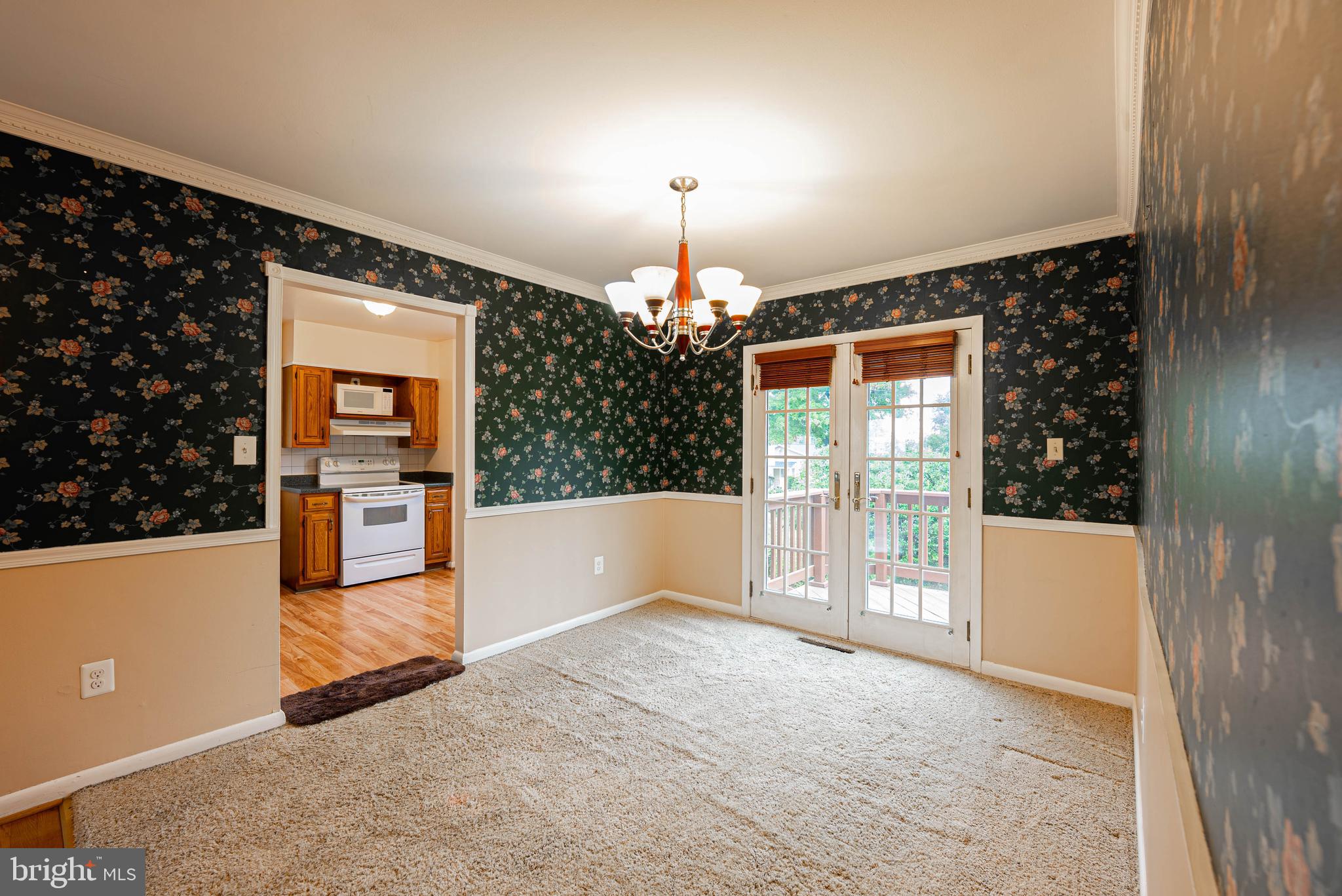 6102 Collinsway Road Baltimore, MD 21228 - Photo 6 of 45 Dining Room with French Doors to Deck