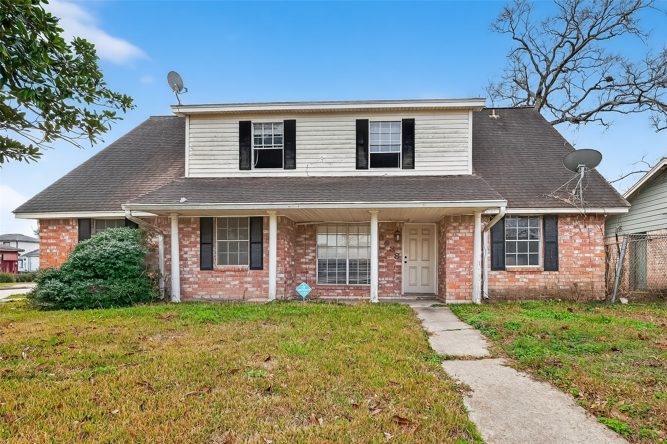 8438 Gallahad Street Houston, TX 77078 - Photo 1 of 36 front view of a house with a yard
