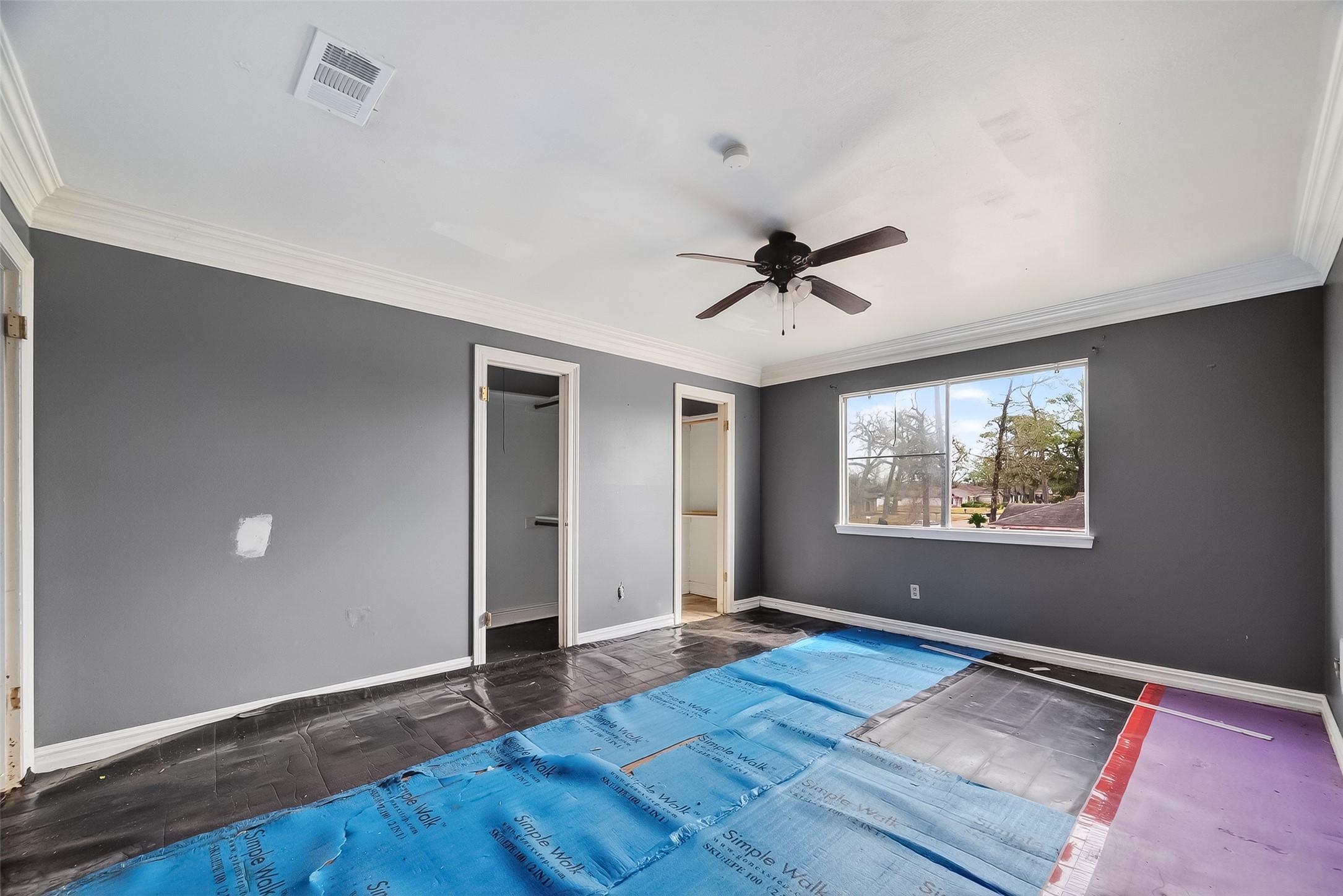 8438 Gallahad Street Houston, TX 77078 - Photo 21 of 36 wooden floor in an empty room with a window