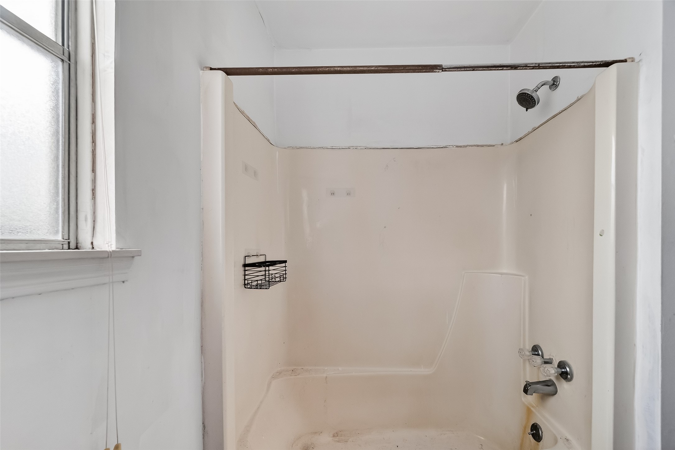8438 Gallahad Street Houston, TX 77078 - Photo 30 of 36 a bathroom with a shower