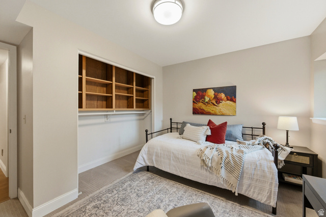 3674 Oak Rim Way Salt Lake City, UT 84109 - Photo 31 of 47 Bedroom featuring light-colored walls, carpeted flooring, and a flush-mount ceiling light