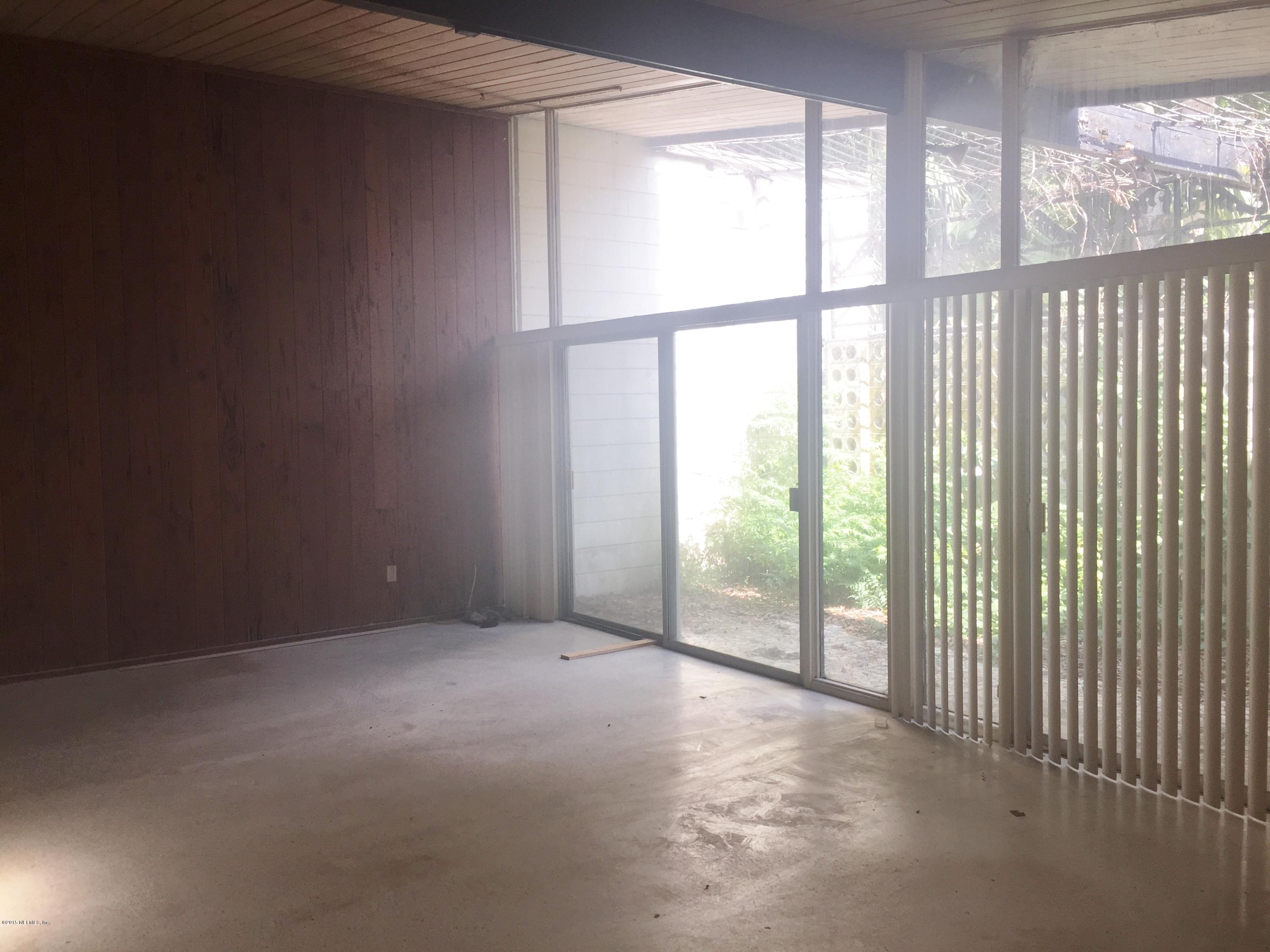 7902 Wildwood Road Jacksonville, FL 32211 - Photo 11 of 16 Master Bedroom Overlooking Courtyard