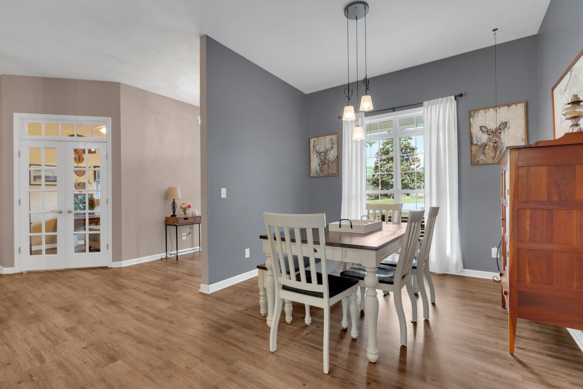 71 Larkspur Court Tullahoma, TN 37388 - Photo 12 of 31 a view of a dining room with furniture window and wooden floor