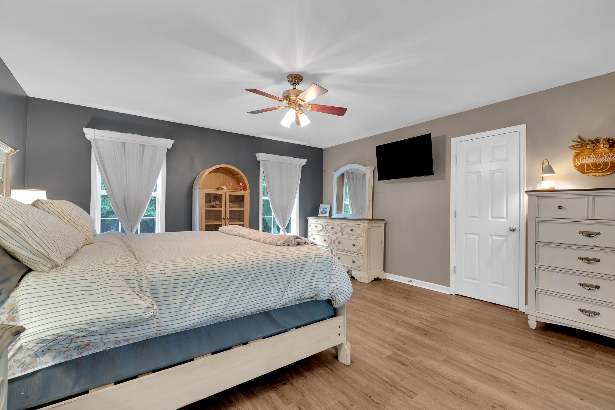 71 Larkspur Court Tullahoma, TN 37388 - Photo 13 of 31 a bedroom with a bed and a flat screen tv