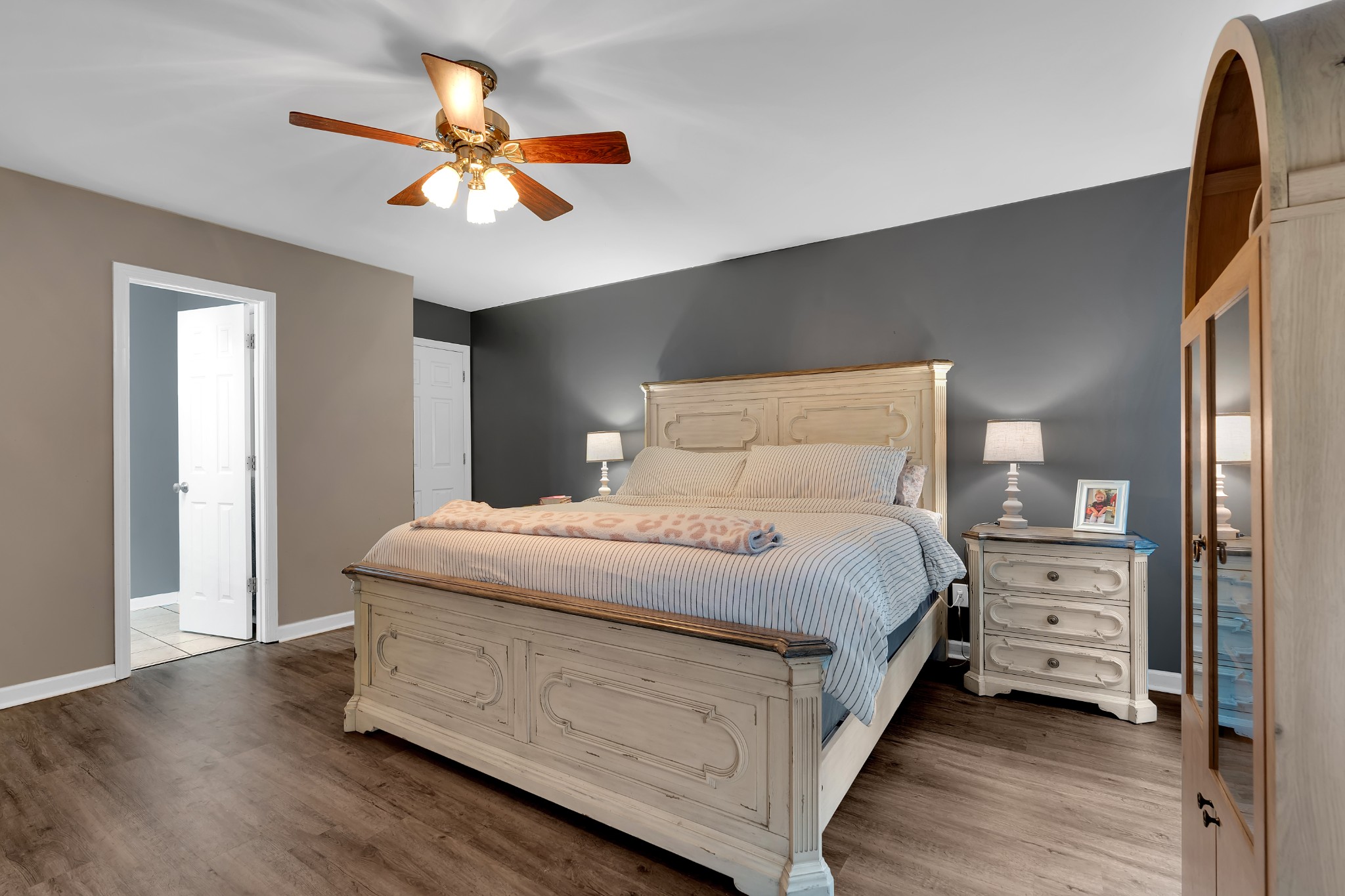 71 Larkspur Court Tullahoma, TN 37388 - Photo 15 of 31 a spacious bedroom with a bed and a ceiling fan