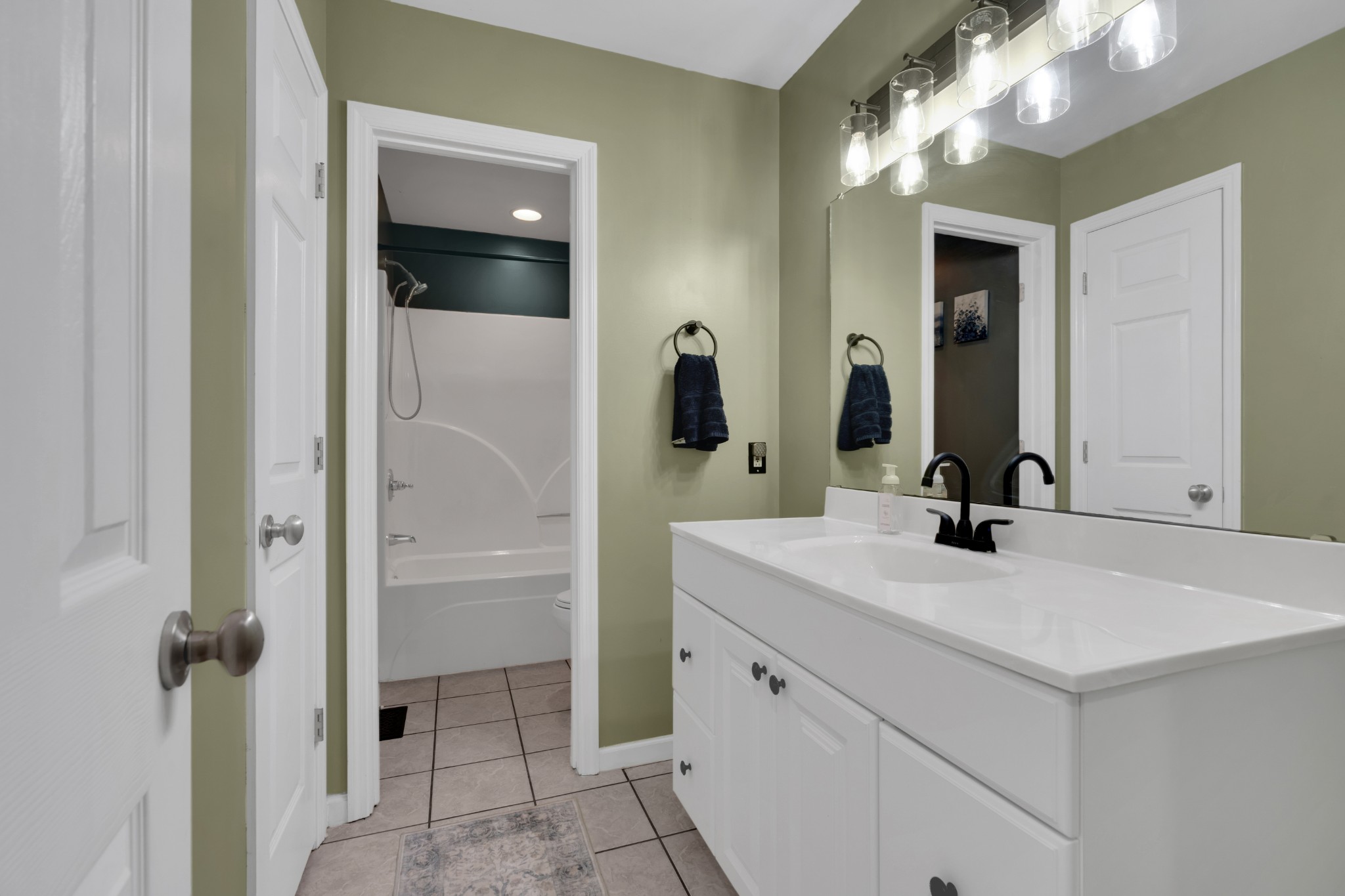 71 Larkspur Court Tullahoma, TN 37388 - Photo 22 of 31 a bathroom with a sink a light fixture and a mirror