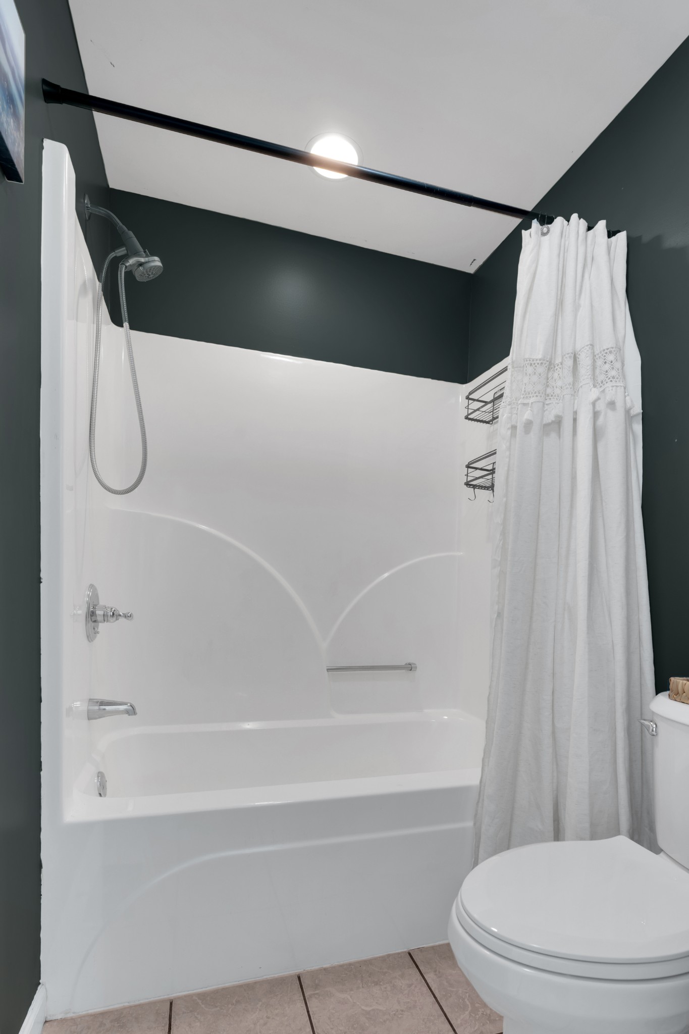 71 Larkspur Court Tullahoma, TN 37388 - Photo 23 of 31 a bathroom with a shower and a toilet