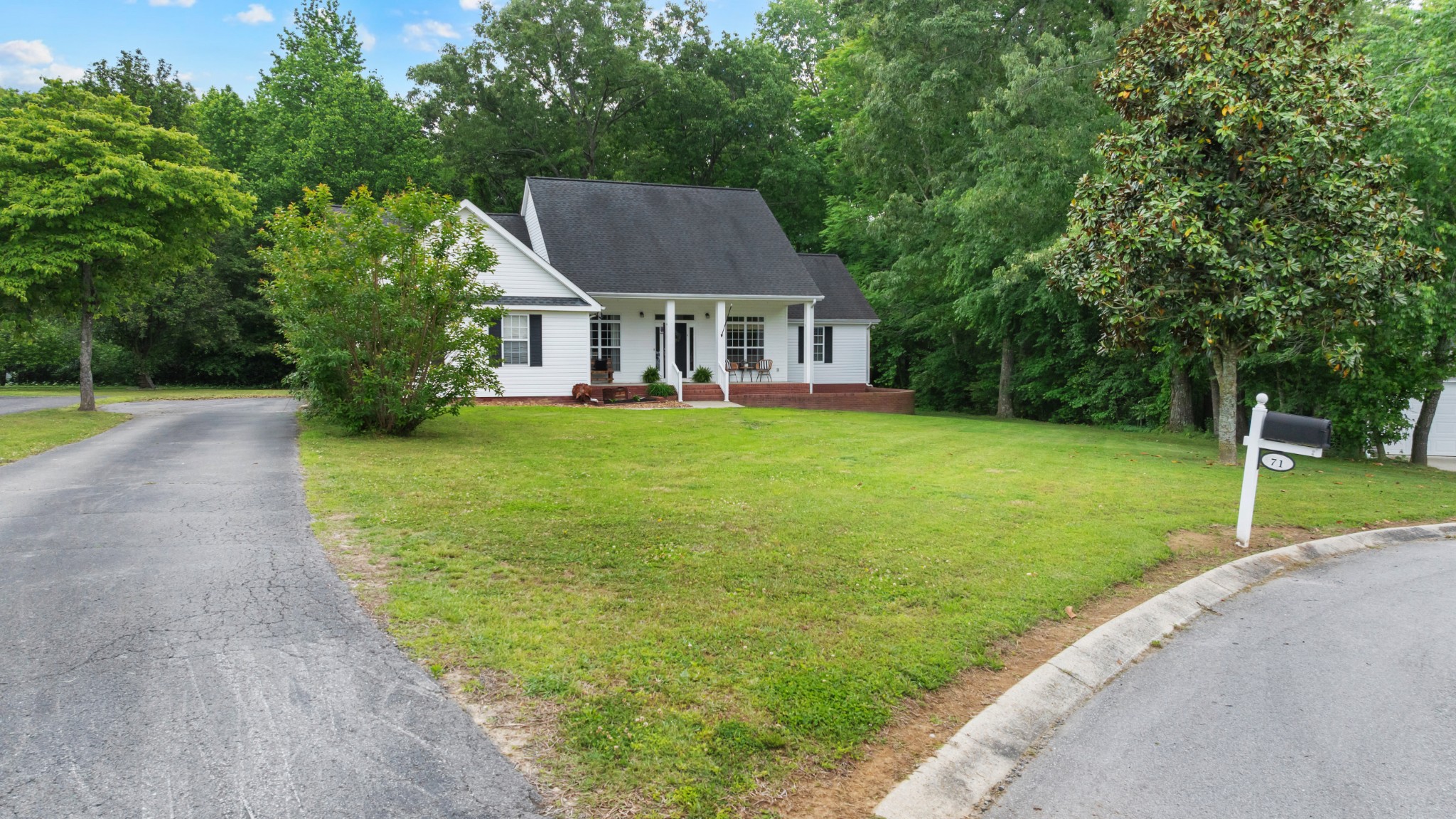 71 Larkspur Court Tullahoma, TN 37388 - Photo 28 of 31 a aerial view of a house with swimming pool next to a big yard