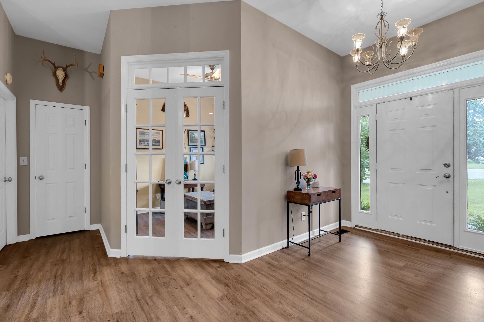 71 Larkspur Court Tullahoma, TN 37388 - Photo 3 of 31 wooden floor in an empty room with a window