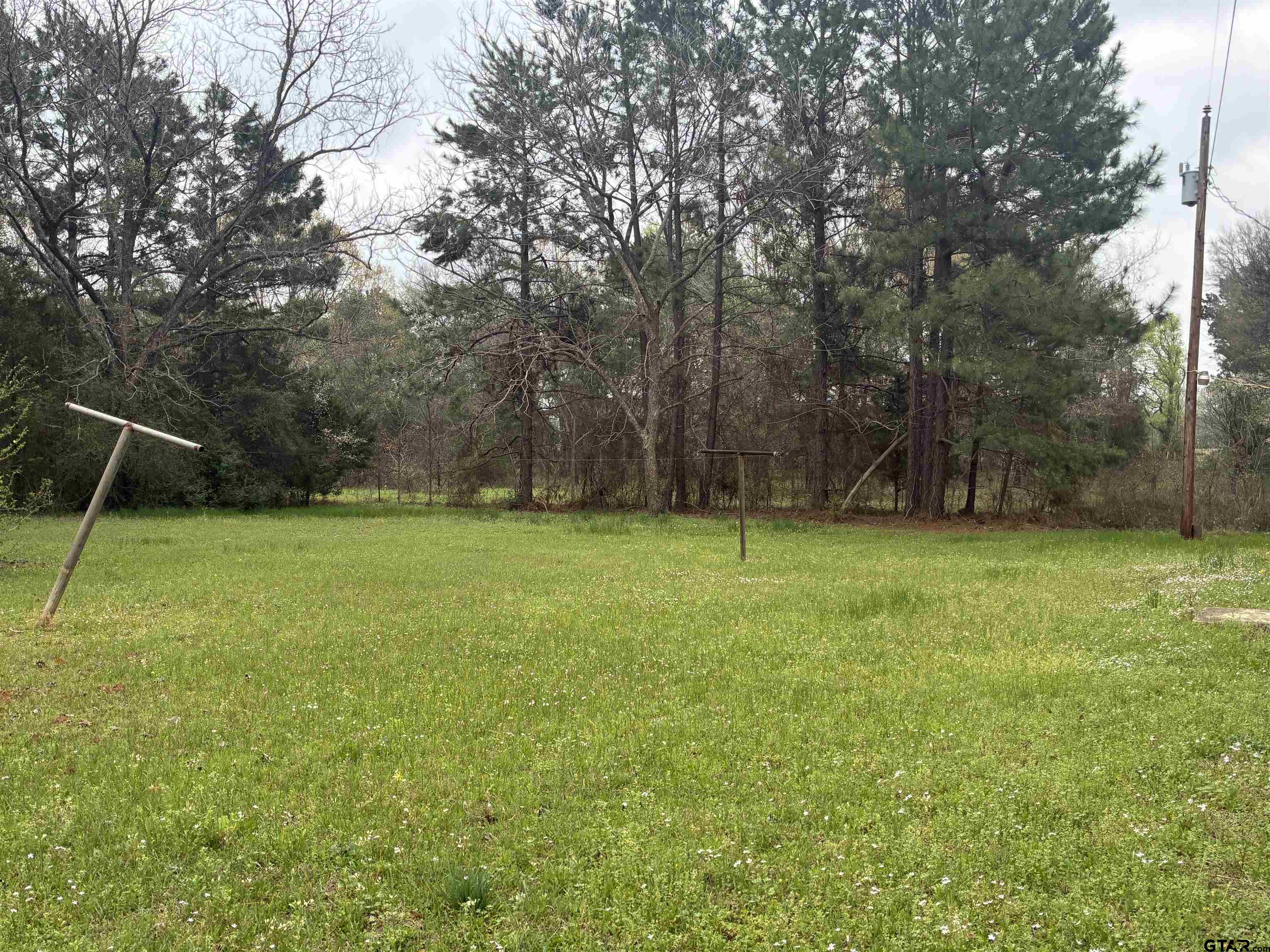 683 County Road 1209 Rusk, TX 75785 - Photo 2 of 10 a view of a yard with a slide