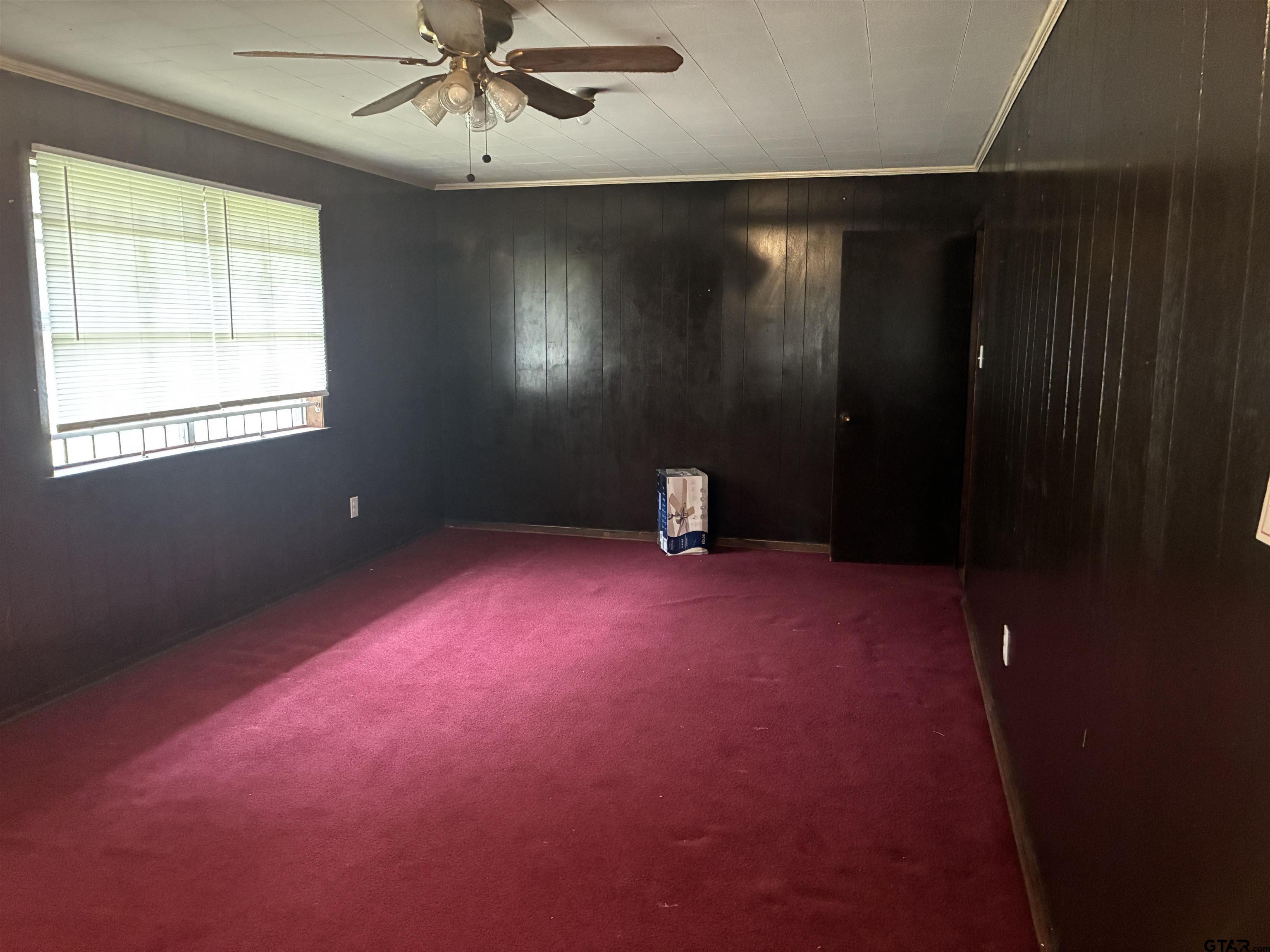 683 County Road 1209 Rusk, TX 75785 - Photo 8 of 10 an empty room with windows and fan