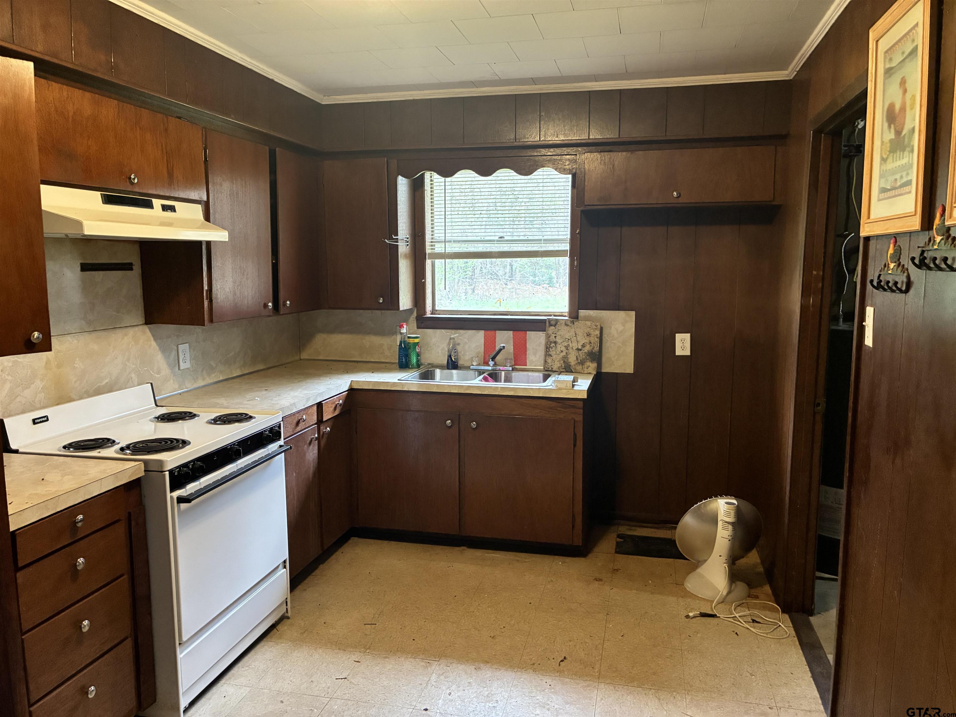 683 County Road 1209 Rusk, TX 75785 - Photo 10 of 10 a kitchen with a sink cabinets and window