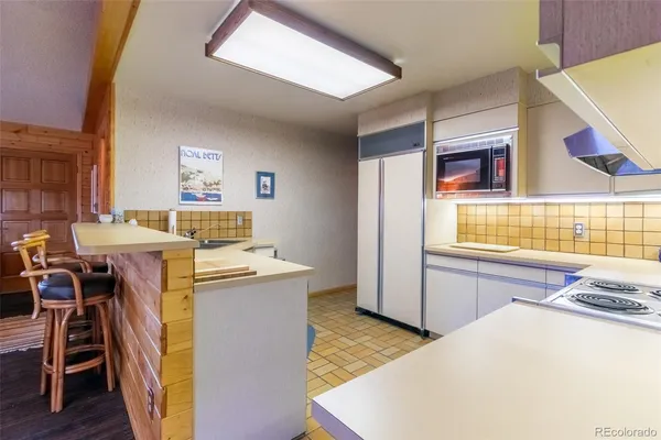 a workspace with furniture and wooden floor