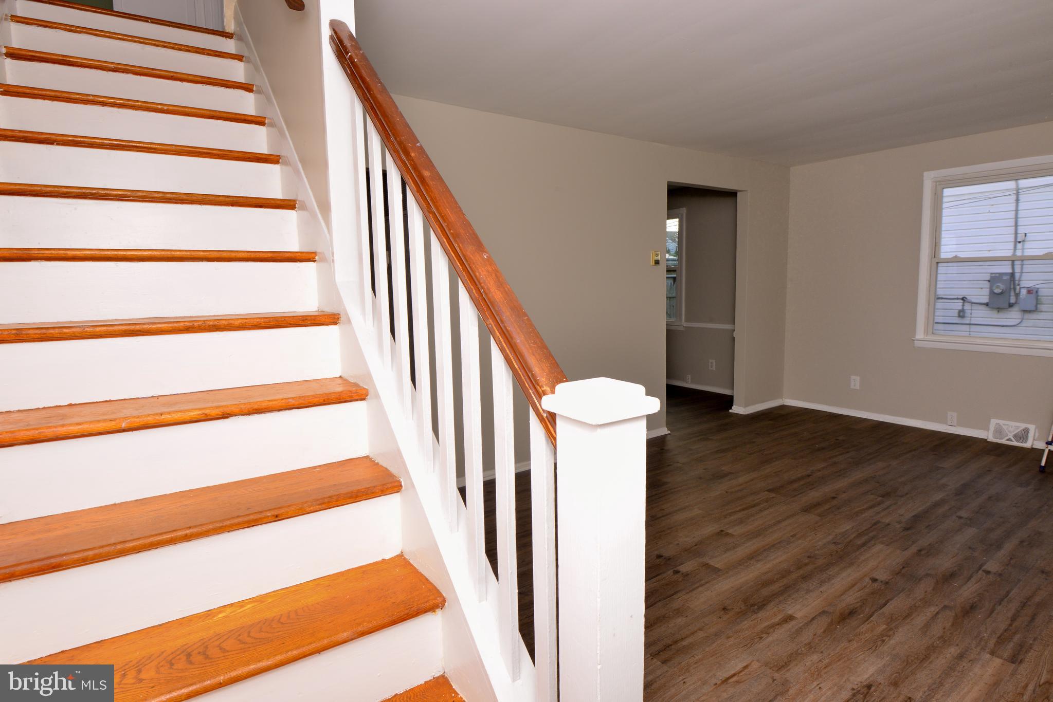 3427 Kimble Road Baltimore, MD 21244 - Photo 11 of 16 Beautiful staircase leading to upper level.
