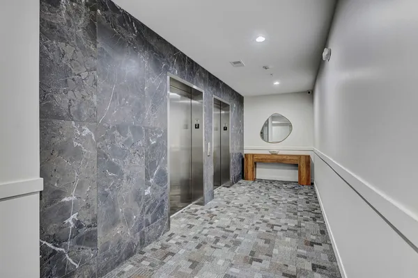 a view of a room with large window