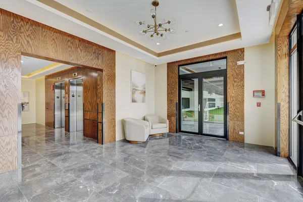 a view of parking garage with cars