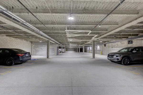 a view of a brick house with many windows