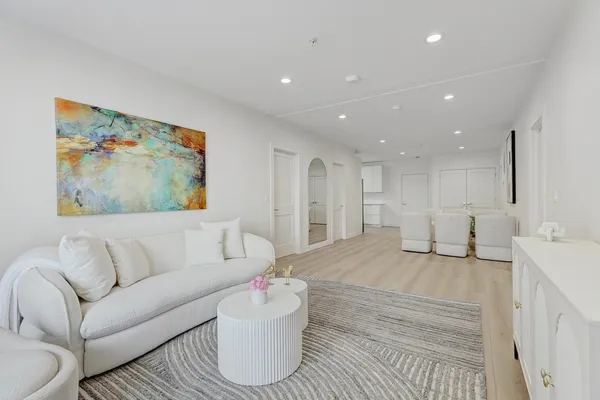 a living room with furniture and a couch