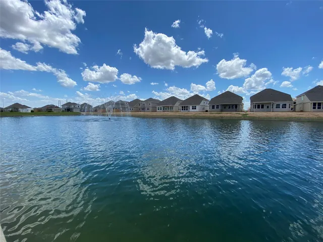 a view of a lake with houses