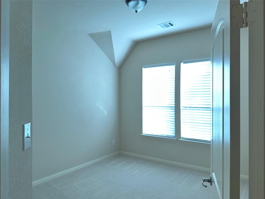 16207 Mapleshade Drive Frisco, TX 75035 - Photo 12 of 16 Carpeted bedroom 3 on second floor