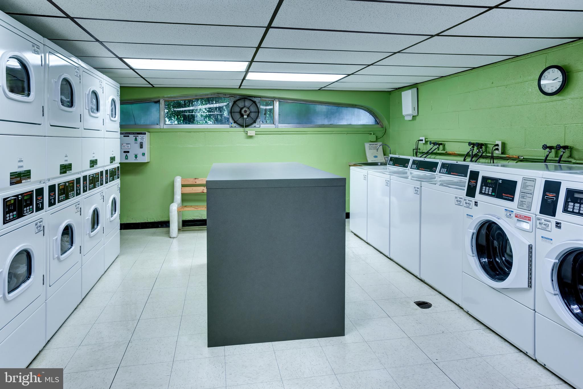 922 24th Street Northwest, Unit 115 Washington, DC 20037 - Photo 34 of 43 a utility room with dryer and washer