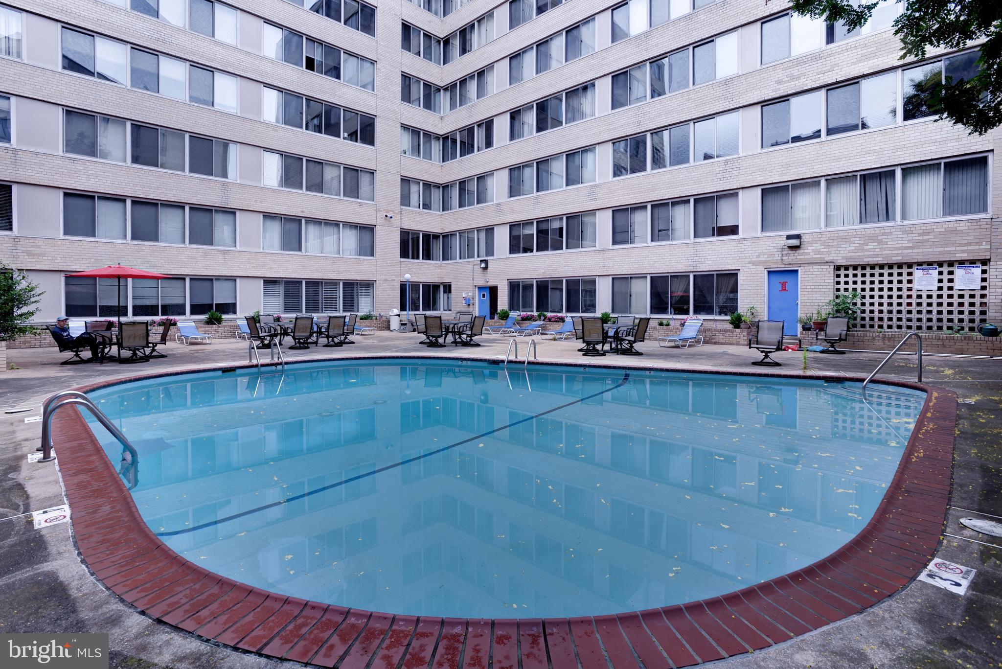 922 24th Street Northwest, Unit 115 Washington, DC 20037 - Photo 43 of 43 a view of swimming pool with outdoor seating