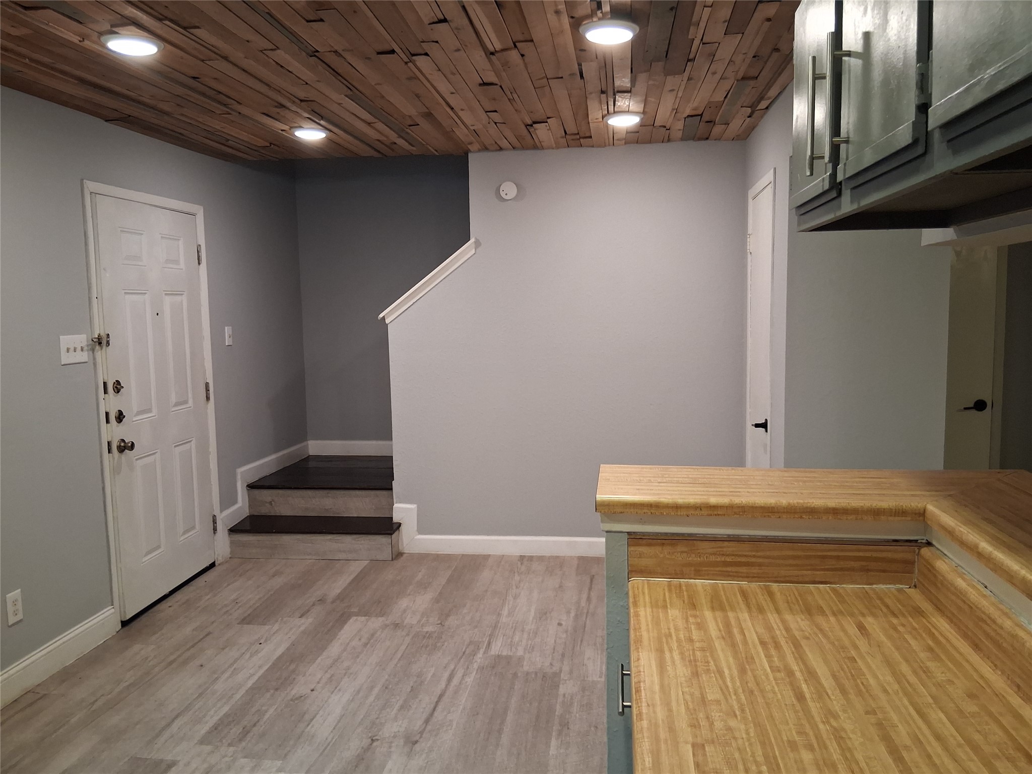 2807 West Slaughter Lane, Unit B Austin, TX 78748 - Photo 4 of 12 a view of a hallway with wooden floor and staircase