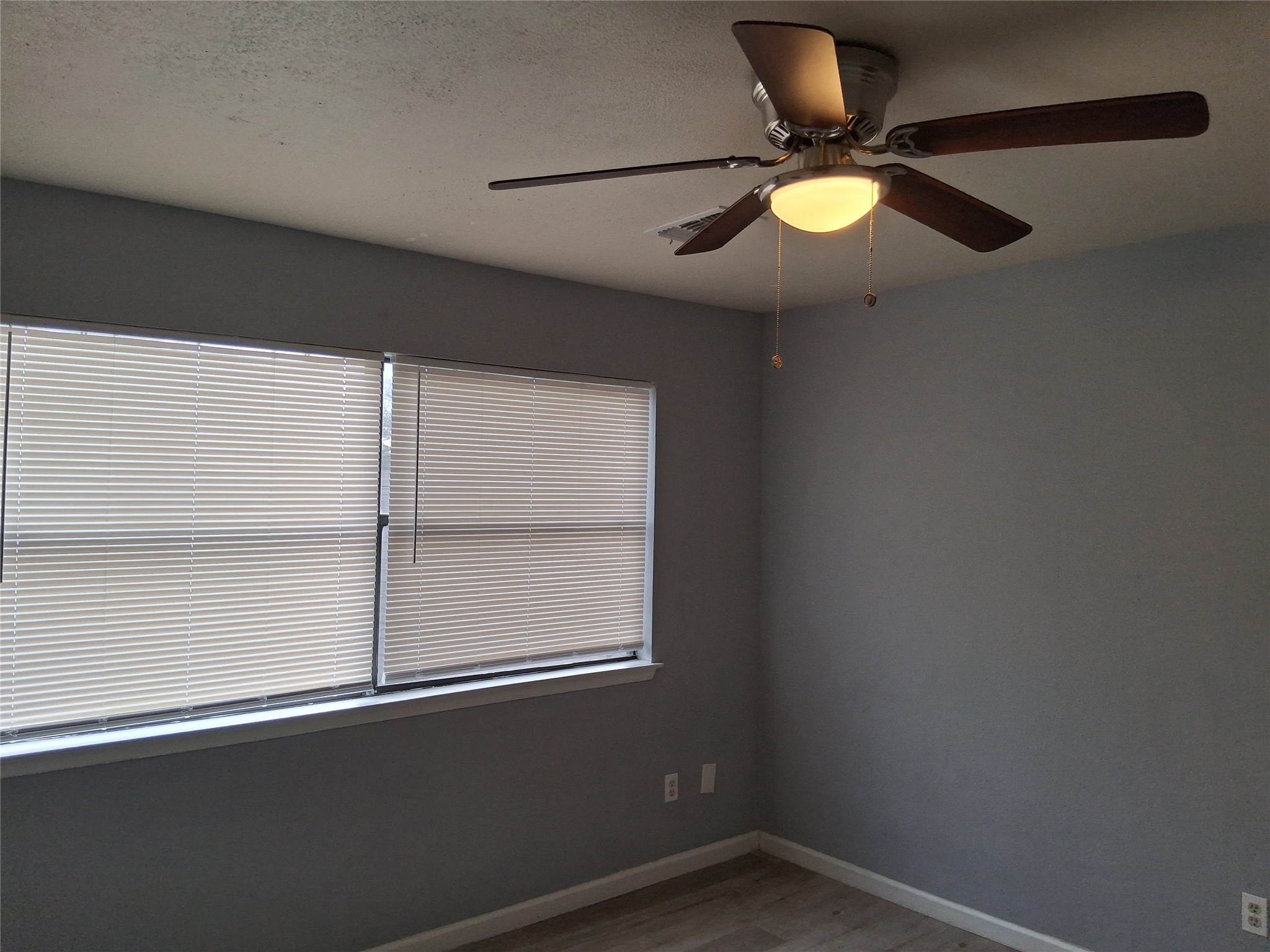 2807 West Slaughter Lane, Unit B Austin, TX 78748 - Photo 5 of 12 a view of an empty room with a window