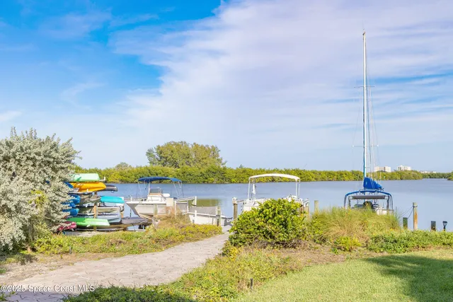 a view of a lake with a nearby beach