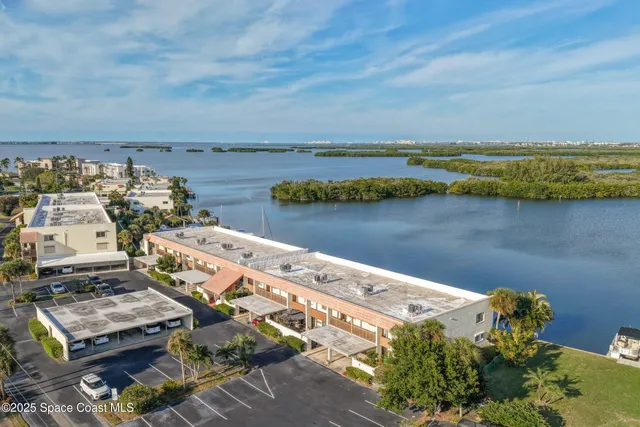 a view of a chairs and table in patio