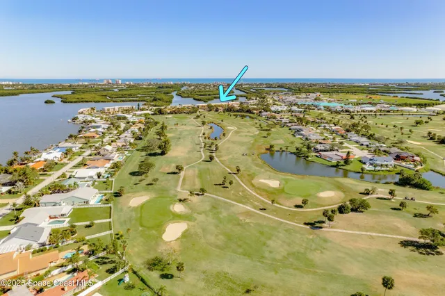 a view of beach and ocean