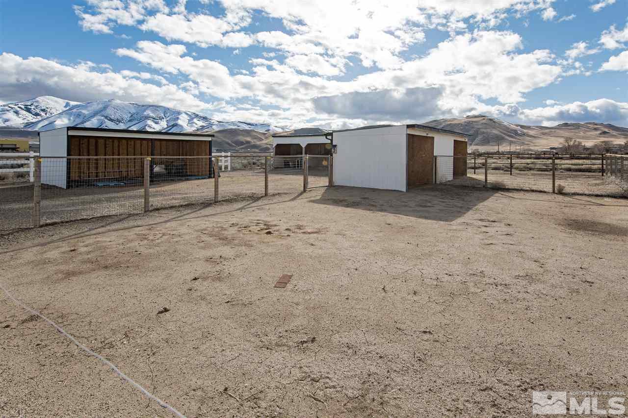 10475 Osage Road Reno, NV 89508 - Photo 21 of 25 a view of house with backyard space and deck