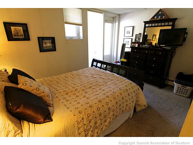 800 Copper Road, Unit 178 Frisco, CO 80443 - Photo 7 of 19 Master Bedroom. Master bedroom has its own private balcony
