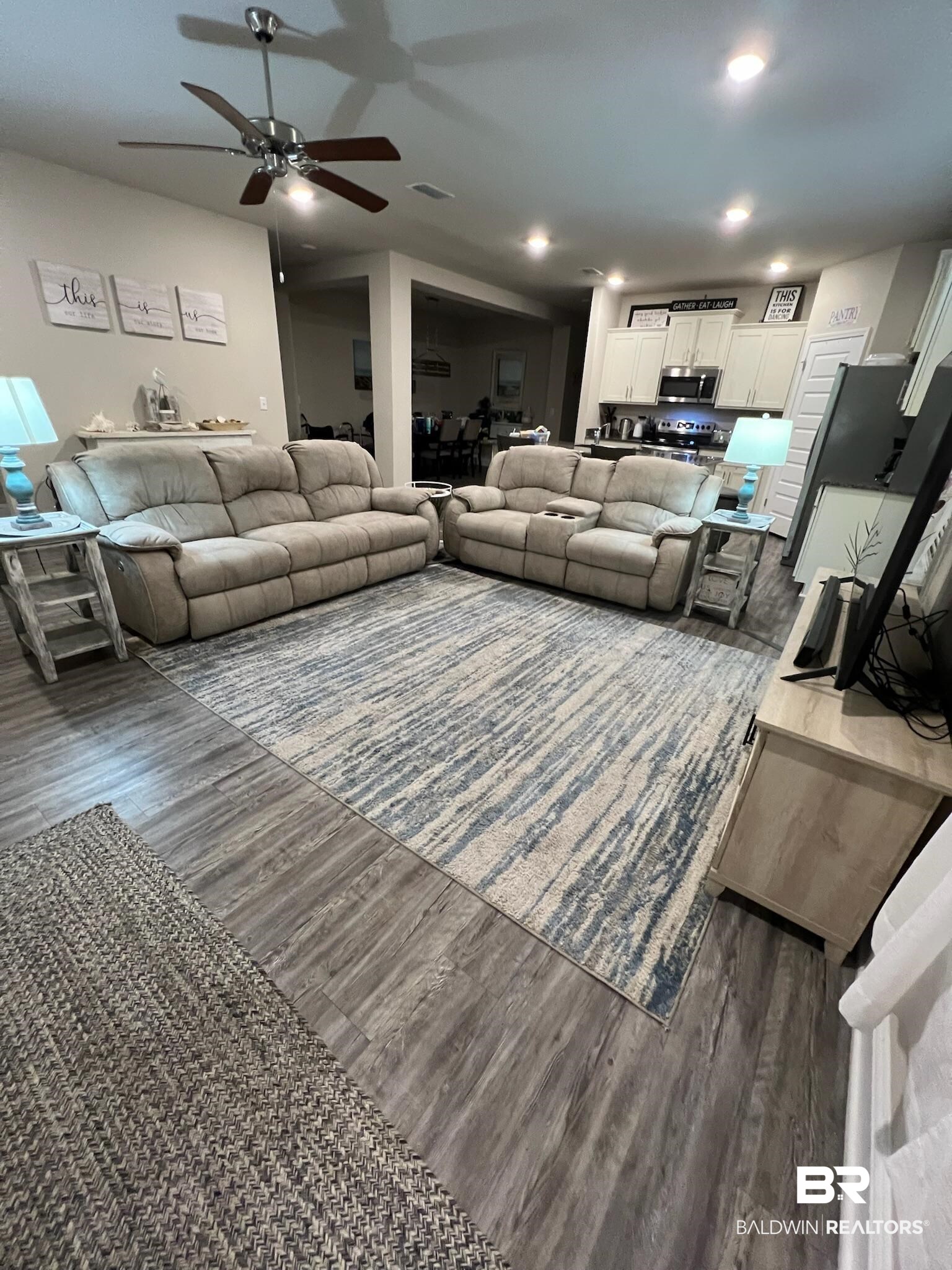3904 Conrad Court Gulf Shores, AL 36542 - Photo 8 of 24 Living room with ceiling fan and hardwood / wood-style flooring