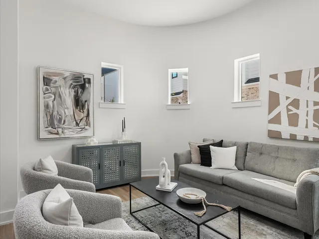 a living room with furniture and a couch