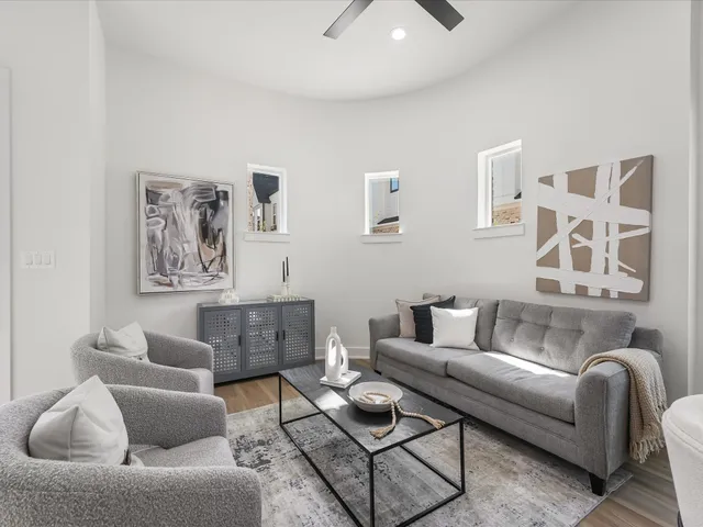 a living room with furniture and a couch