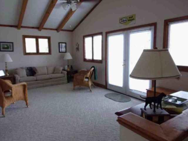 431 Monte Vista Road Union Hall, VA 24176 - Photo 11 of 14 a living room with furniture and a lamp