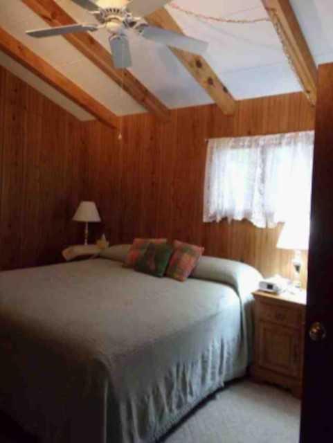 431 Monte Vista Road Union Hall, VA 24176 - Photo 7 of 14 a bedroom with a bed and window