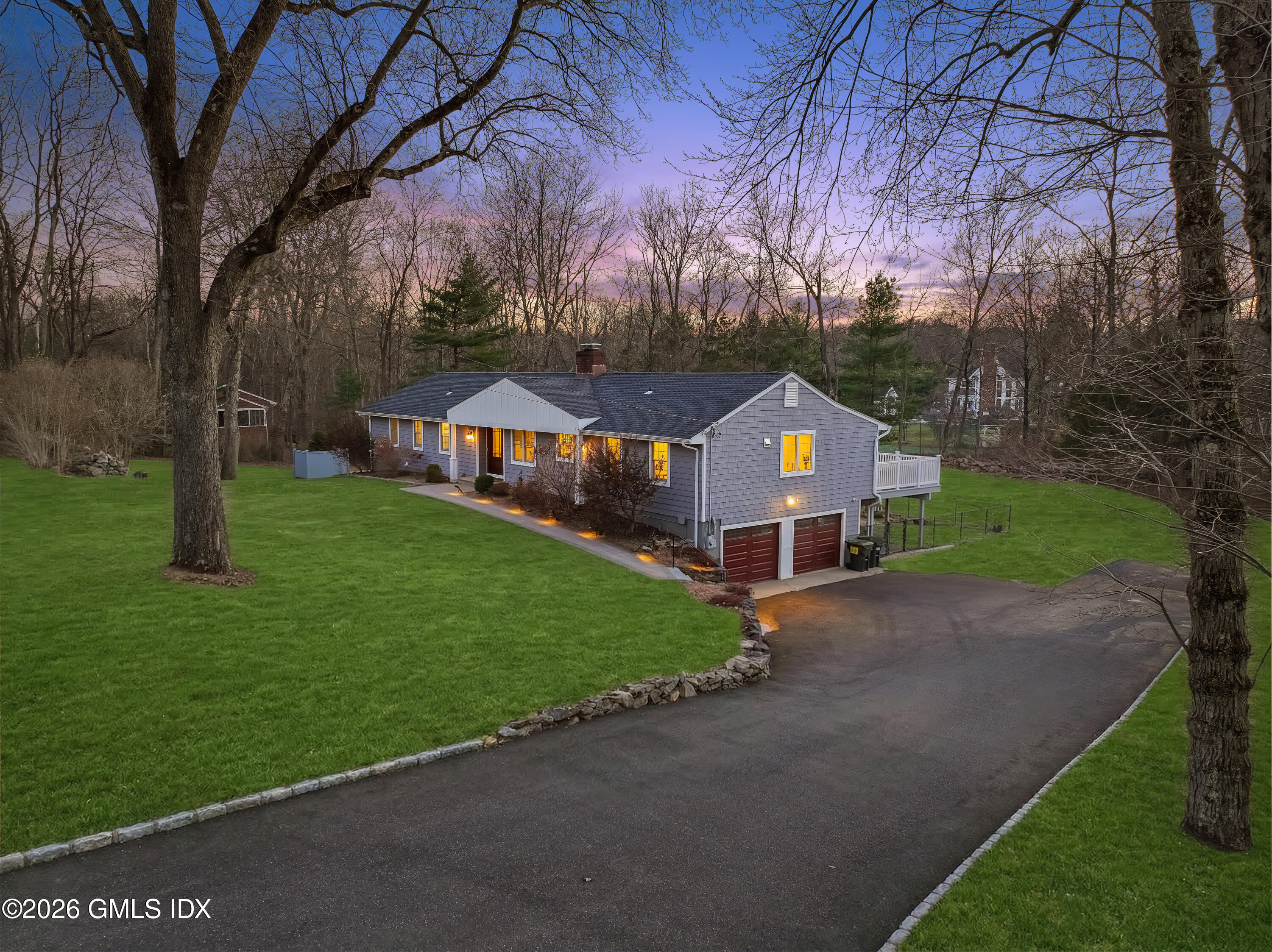 97 Davenport Ridge Lane Stamford, CT 06903 - Photo 1 of 31 a front view of a house with garden